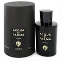 Sophisticated Acqua Di Parma Ambra 3.4 oz black Eau de Parfum spray and matching cylindrical box with elegant gold branding.