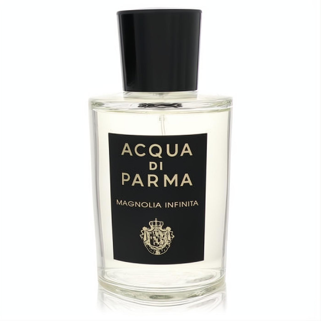 Luxurious Acqua Di Parma Magnolia Infinita EDP. Clear glass bottle, black label, gold crest, sleek black cap.