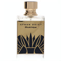 Afnan Edict Musctique Extrait De Parfum. Clear glass bottle, luxurious gold cap, and striking black art deco design on a gold panel.