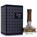 Afnan Mirsaal of Trust 3 oz EDP. Dark blue box with intricate silver pattern. Elegant bottle, amber liquid, unique wood-grain cap.