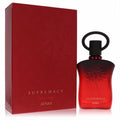 Afnan Supremacy Tapis Rouge 3 oz extrait de parfum. Striking red ombre glass bottle, black cap, gold accents, and matching embossed box.