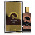 Memo African Leather EDP: sleek black bottle, gold cap, and exotic leopard design. Paired with its luxurious gold and black box.