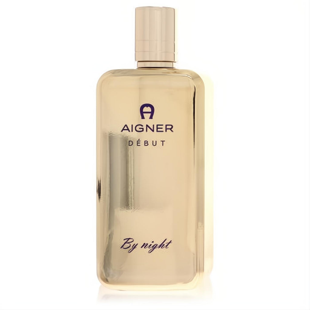 Elegant metallic gold Aigner DÉBUT By night Eau De Parfum spray, a sleek women's fragrance bottle.