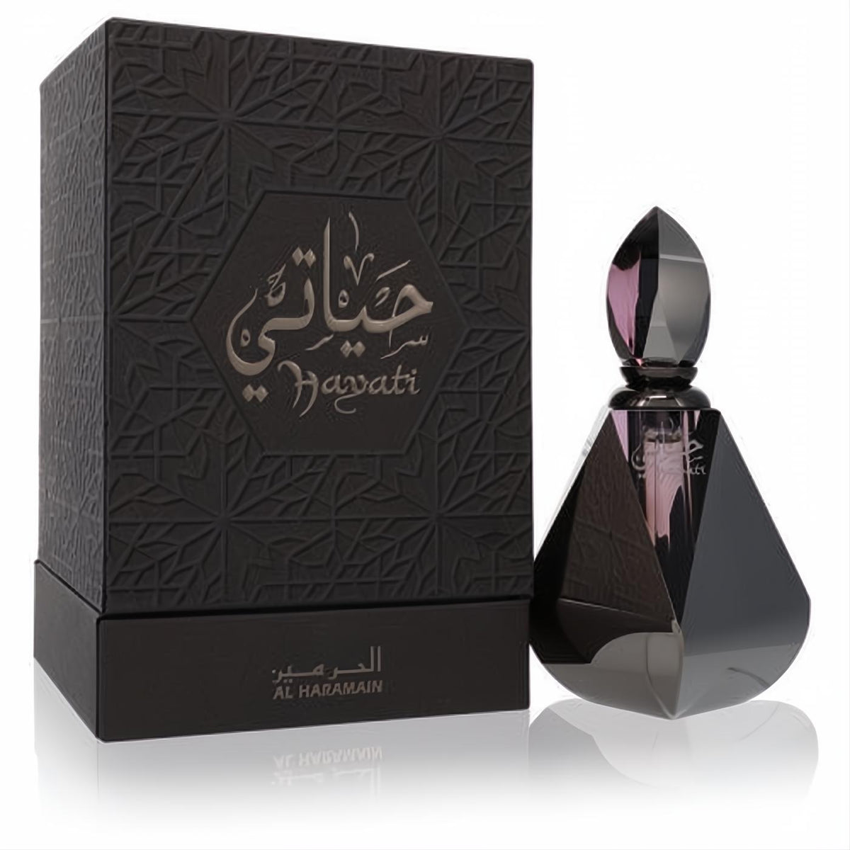 Al Haramain Hayati 0.4oz EDP. Dark, faceted bottle with a pointed cap, beside its elegant embossed black geometric box.