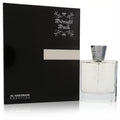 Al Haramain Midnight Musk 3.4 oz unisex EDP. Sleek clear glass bottle with silver cap, next to its elegant black and silver box.