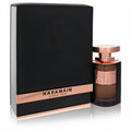 Al Haramain Portfolio Floral Sculpture 2.5 oz EDP. Elegant black box with rose gold "HARAMAIN" band, sleek amber glass bottle.