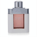 Rasasi Al Wisam Day Born To Win 3.33 oz men's Eau de Parfum. Elegant ribbed white bottle, silver cap, and captivating rose-gold liquid.