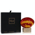 Luxurious The House of Oud Almond Harmony EDP 2.5 oz with vibrant red & gold swirled bottle on ornate base, beside elegant black box.
