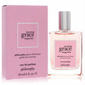 Philosophy Amazing Grace Magnolia 2 oz Eau De Parfum. Elegant pink fragrance in a clear glass bottle with silver cap and matching pink box.
