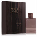 Al Haramain Amber Oud Exclusif Classic 2 oz unisex perfume. Striking rose gold bottle and sophisticated dark wood-grain gift box.