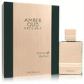 Luxurious Al Haramain Amber Oud Exclusif Emerald 2 oz unisex perfume. Sleek rose gold bottle and matching deep green box.