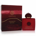 Luxurious Amouage Crimson Rocks unisex fragrance. Bold crimson red bottle with a ridged cap and elegant gold branding on bottle and box.