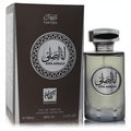 Luxurious Ana Assali by Rihanah 3.4 oz unisex EDP. Clear ribbed bottle, silver cap, and sophisticated dark brown box with Arabic script.