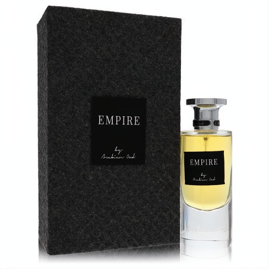 Luxurious Arabian Oud Empire unisex EDP. Clear bottle with golden liquid, sleek silver cap, and a dark textured gift box.