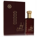 Ard Al Zaafaran Ahlam Al Khaleej 2.7 oz unisex EDP. Maroon bottle with ornate gold cap, elegant Arabic script, and matching gift box.