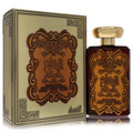 Ard Al Zaafaran Al Ibdaa 3.4 oz women's EDP bottle, rich amber glass with gold ornate label and cap, next to its matching gold embossed box.