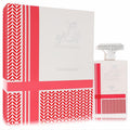 Attar Al Ghutra 3.4 oz EDP in a white bottle with bold red Ghutra-inspired patterns and dazzling crystal cap, beside its matching box.