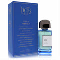 Bdk Villa Neroli unisex fragrance, 3.4 oz, in a sleek blue glass bottle with black cap, beside its striking royal blue box.