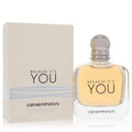 Emporio Armani Because It's You 3.4 oz EDP. Sophisticated clear glass bottle with golden fragrance, unique silver cap, and elegant beige box.