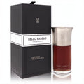 Elegant Bello Rabelo by Liquides Imaginaires Eau de Parfum. Dark red fragrance in a sleek glass bottle with a silver cap, beside its textured black box.