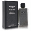 Bentley Momentum Unbreakable 3.4 oz EDP. Sophisticated clear glass bottle with black textured label and matching box.