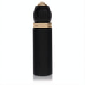 Luxurious Black Muscs .27 oz mini EDP spray. Sleek black bottle with a distinctive ribbed gold cap.