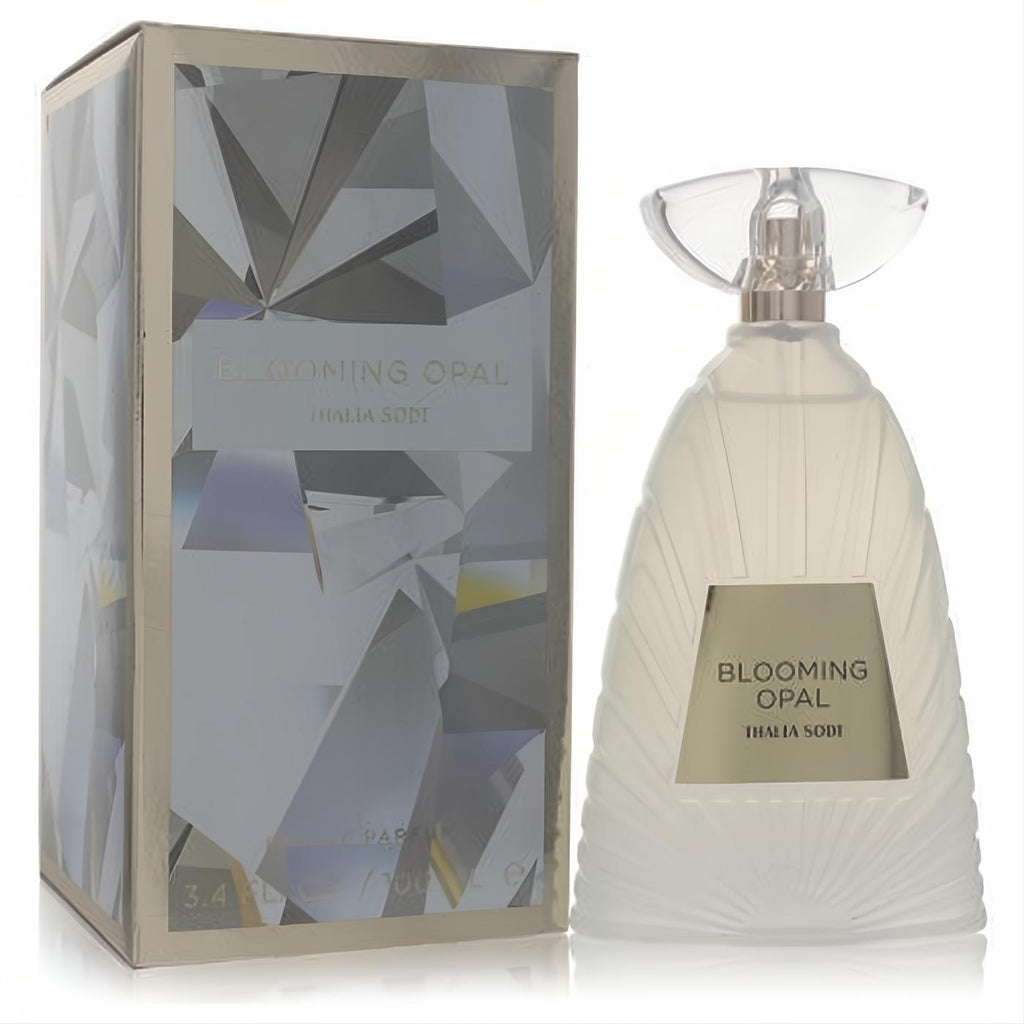 Thalia Sodi Blooming Opal 3.4 oz women's EDP. Frosted faceted bottle with unique clear cap, beside a shimmering geometric box.
