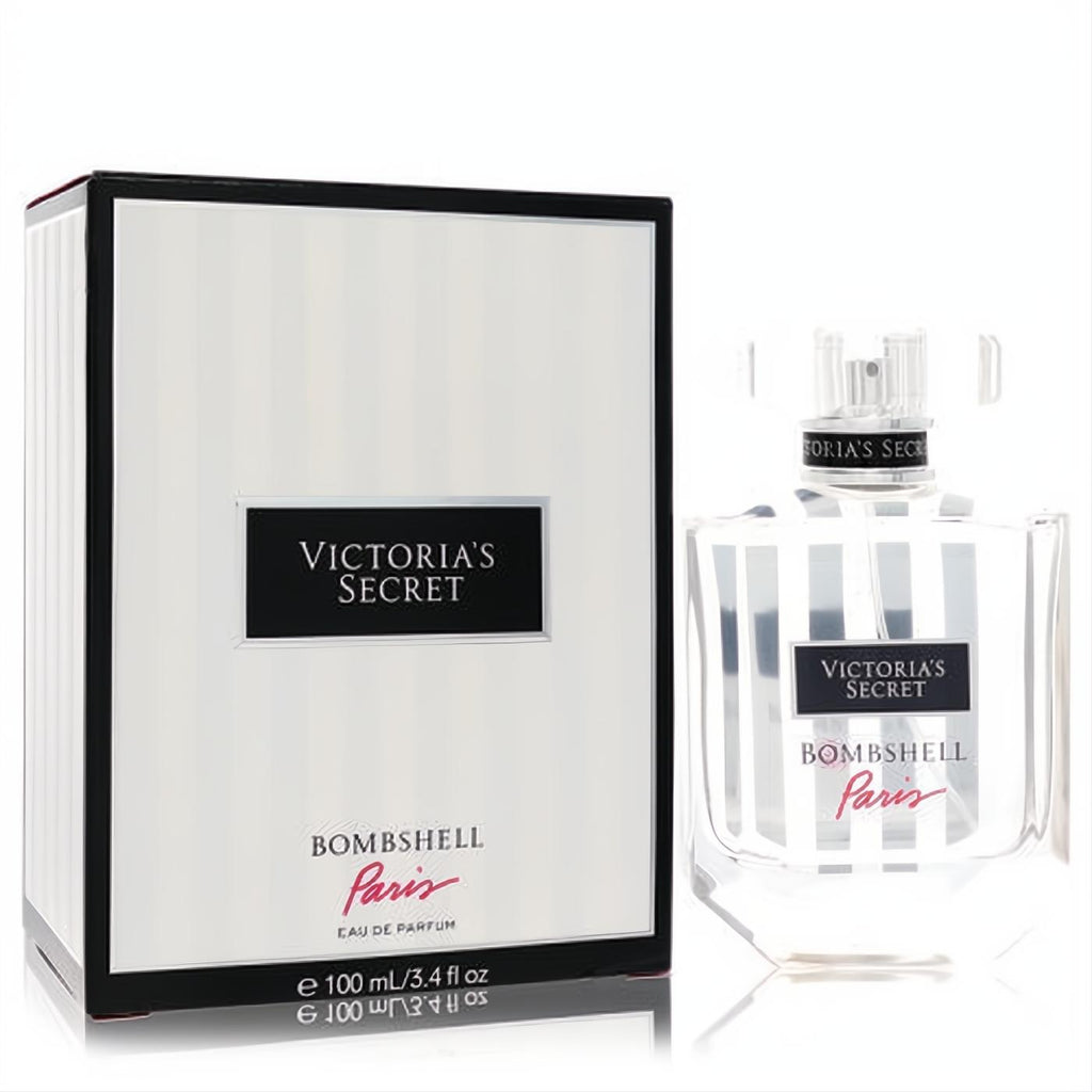 Elegant Victoria's Secret Bombshell Paris 3.4 oz EDP. Clear striped bottle, chic white and black striped box with red Paris script.