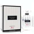 Elegant Victoria's Secret Bombshell Paris 3.4 oz EDP. Clear striped bottle, chic white and black striped box with red Paris script.