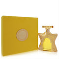Luxurious Bond No. 9 Dubai Citrine 3.4 oz unisex EDP. Gold star bottle with intricate filigree, vibrant yellow box & gold emblem.