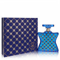 Captivating Bond No. 9 Nomad 3.4 oz EDP. Iconic blue bottle and box with shimmering rhinestone grid design.