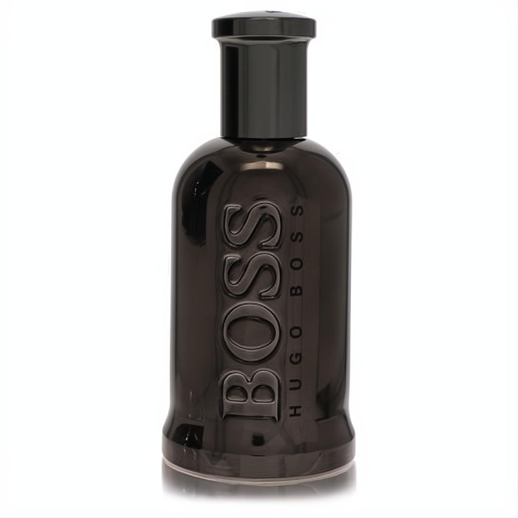 Bold Boss Bottled United 3.3 oz men's fragrance. Sleek, glossy dark grey bottle with prominent BOSS branding.