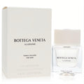 Exquisite Bottega Veneta Illusione Tonka Solaire 1.7 oz EDP. Clear square bottle, frosted cap, and chic white packaging.