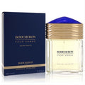 Boucheron Pour Homme 3.3 oz EDT spray. Clear faceted bottle with a gold ribbed collar, deep blue cap, and elegant navy box.