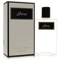 Discover Brioni Eclat 3.4 oz Eau De Parfum spray. Frosted white bottle and light grey box with elegant black branding.