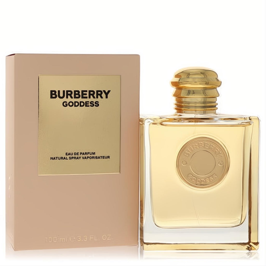 Burberry Goddess Eau De Parfum 3.3 oz refillable spray. Golden liquid in an elegant clear bottle with a distinctive gold cap and peach box.