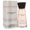 Elegant Burberry Touch 3.3 oz EDP for Women. Clear bottle with soft pink fragrance, dark wood cap, and classic plaid box.