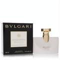 Luxurious Bvlgari Splendida Patchouli Tentation 3.4 oz EDP. Frosted glass bottle with elegant gold cap, beside its sleek black and gold box.