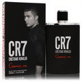 Sleek matte black CR7 Game On Eau De Toilette spray, 3.4 oz, with bold white and red text. Matching box shows Cristiano Ronaldo.
