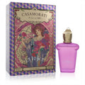 Exquisite Casamorati La Tosca 1 oz EDP. Features a frosted purple bottle with a luxurious gold cap, next to its ornate, vintage-art box.