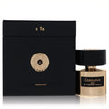 Casanova by Tiziana Terenzi 3.38 oz unisex perfume: a radiant gold bottle with black label, next to its luxurious black and gold box.