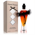 Elegant Chantal Thomass Gold 3.3 oz Eau De Parfum spray. Unique amber bottle with a chic black tulle bow, paired with a matching gold box.
