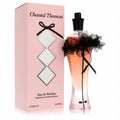 Chantal Thomass Pink 3.3 oz Eau de Parfum. Elegant pink bottle with black cap, delicate black ribbon, and tulle bow. Chic pink box.