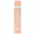 Elegant Revlon Charlie Chic body spray. Peach aerosol can with graceful white swirls and a matching cap, exuding modern femininity.