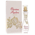 Christina Aguilera Woman 1 oz EDP spray: elegant clear curved bottle with luxurious gold floral details and matching white box.