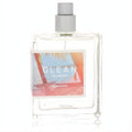 Clean Sunshine unisex De Toilette tester. Clear 2.14 oz glass spray bottle with a vibrant beach label featuring palm trees.