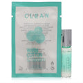 Experience Clean Warm Cotton & Mandarine .17 oz mini rollerball perfume. Clear glass bottle, silver cap, light green liquid, with vibrant teal pouch.