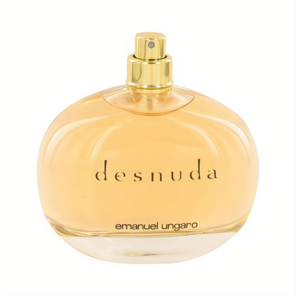 Elegant Desnuda by Ungaro 3.4 oz EDP tester. Clear round glass bottle with warm amber liquid and luxurious gold sprayer.