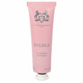 Delina by Parfums De Marly 1 oz pink hand cream tube. Features elegant horse logo and 'Crème Mains' for luxurious pampering.