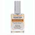 Demeter Dulce De Leche 1 oz cologne spray. Clear rectangular glass bottle with a silver cap and warm caramel-colored liquid.